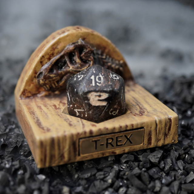 D20 single die display stand holding a T-Rex fossil D20